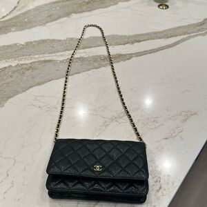 Very classy black with gold trim, Chanel imposter/hipster.